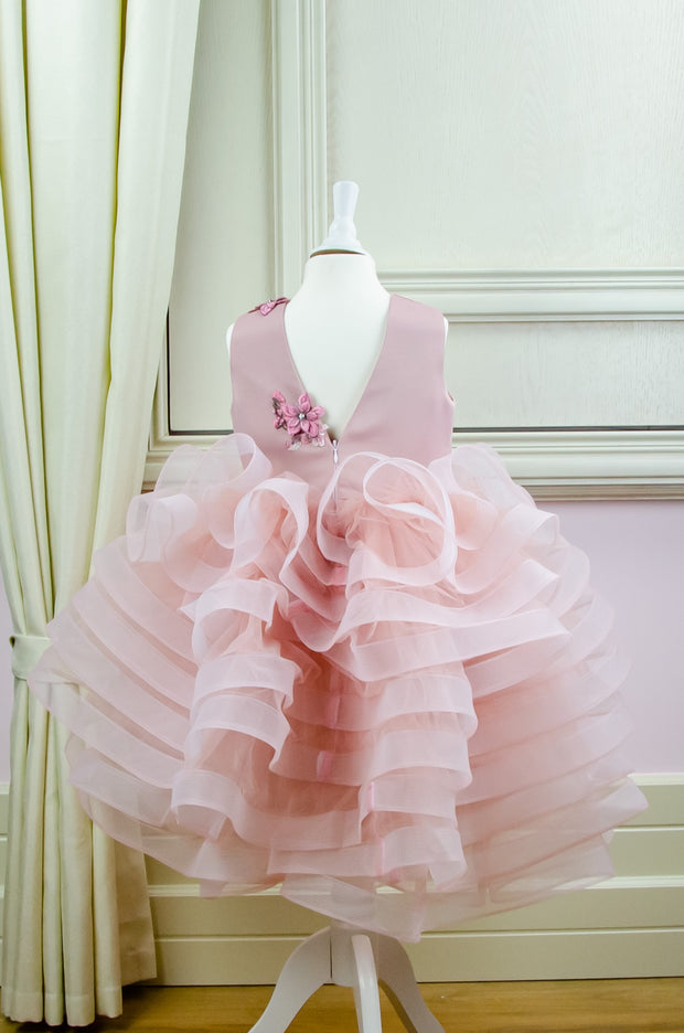 handmade, blush pink flower girl dress with a voluminous, multi-layer tulle skirt with floral embroidery