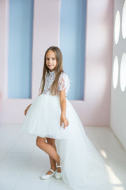 handmade, white princess girl dress with a high low hemline, short white tutu, tulle train, lace top, short sleeves and feather details.