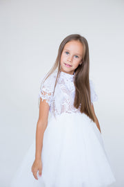 handmade, white princess girl dress with a high low hemline, short white tutu, tulle train, lace top, short sleeves and feather details.