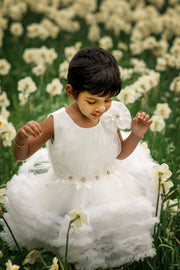 Short white princess tutu dress with tulle skirt, pleated top and floral embellishment, for special occasions: Wedding, Birthday party, Prom, Flower girl, Eid, and other events. 