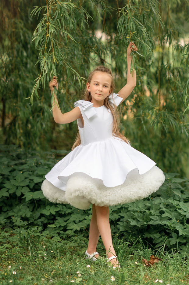 Short white satin tutu dress with tulle ruffles and satin ribbons on the shoulders. For special occasions: Wedding, Birthday party, Prom, Flower girl, Eid, and other events.