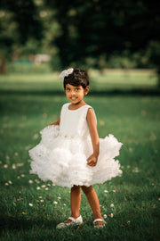 Short white princess tutu dress with tulle skirt, pleated top and floral embellishment, for special occasions: Wedding, Birthday party, Prom, Flower girl, Eid, and other events. 