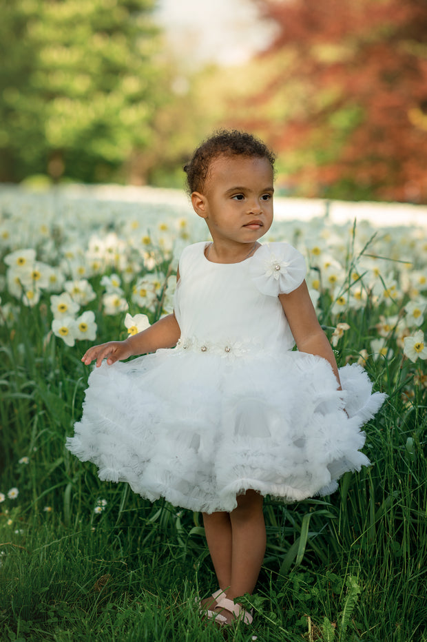 Short white princess tutu dress with tulle skirt, pleated top and floral embellishment, for special occasions: Wedding, Birthday party, Prom, Flower girl, Eid, and other events. 