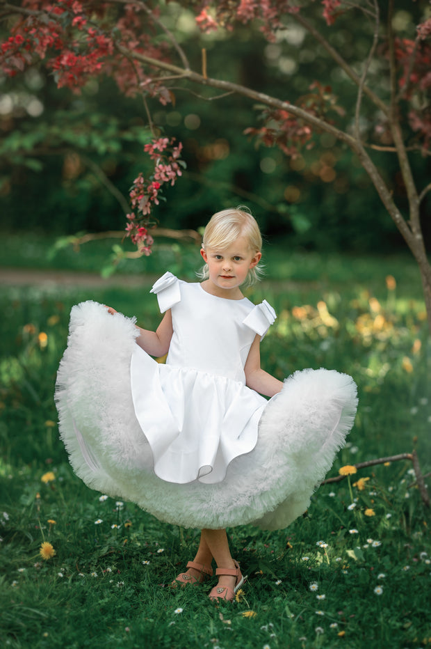 Short white satin tutu dress with tulle ruffles and satin ribbons on the shoulders. For special occasions: Wedding, Birthday party, Prom, Flower girl, Eid, and other events.