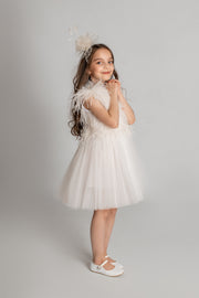 Knee-length elegant girl dress with a tulle skirt and top embellished with feathers for special occasions, weddings, flower girls, first communion dress.