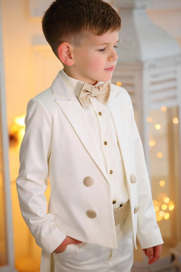 handmade white ring bearer tuxedo suit for boys with a white shirt and a beige bow tie