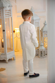 handmade white ring bearer tuxedo suit for boys with a white shirt and a beige bow tie