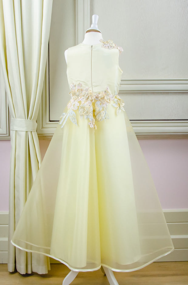 handmade long yellow A-line flower girl dress with a long tulle skirt and hand-embroidered top with flowers, pearls and rhinestones.