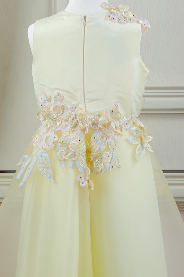 handmade long yellow A-line flower girl dress with a long tulle skirt and hand-embroidered top with flowers, pearls and rhinestones.