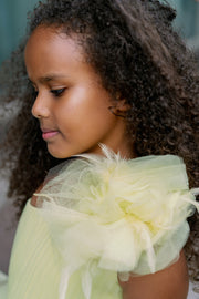 Knee-lenght bright yellow girl tutu dress with ruffles, asymmetrical pleated tulle top and a big 3D flower detail. For special occasions: Wedding, Birthday party, Prom, Flower girl, Eid, and other events.